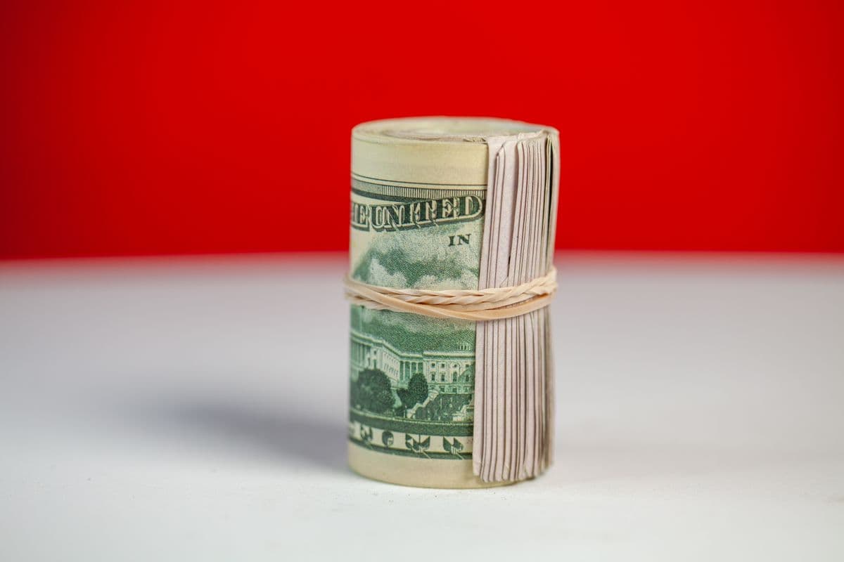 Stack of US dollar bills bound with a band