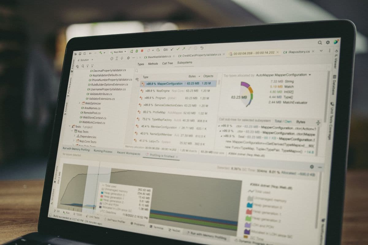 Laptop displaying financial data and analysis