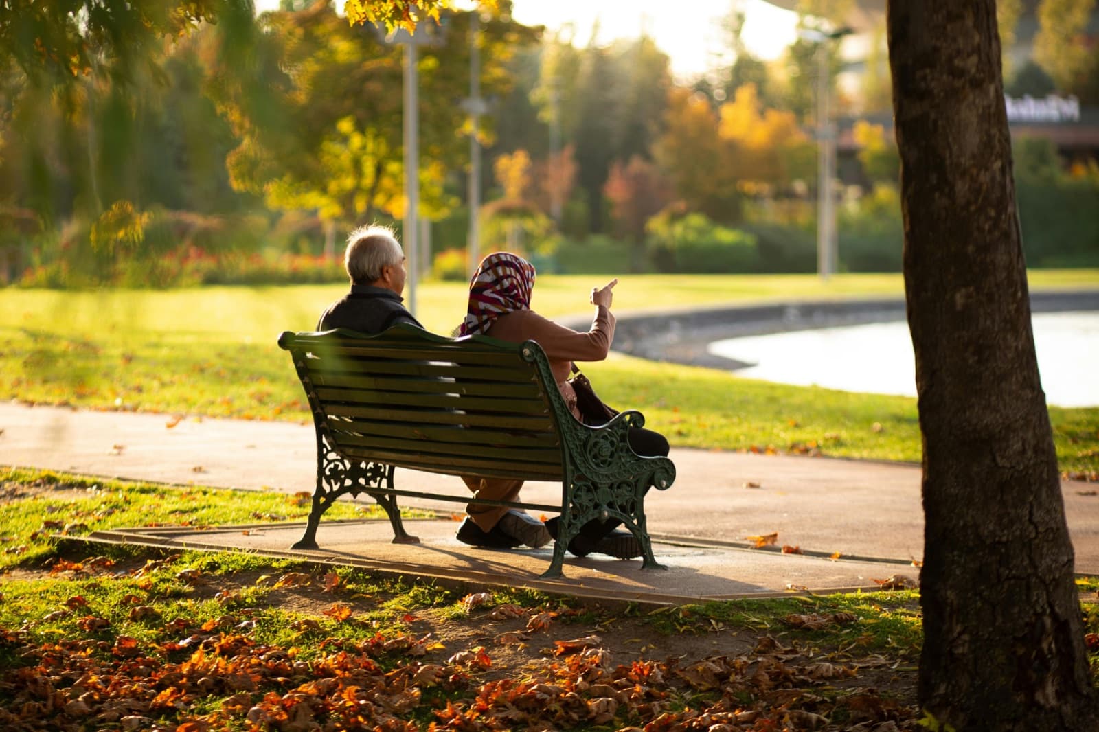 Couple reviewing Social Security benefits with financial advisor